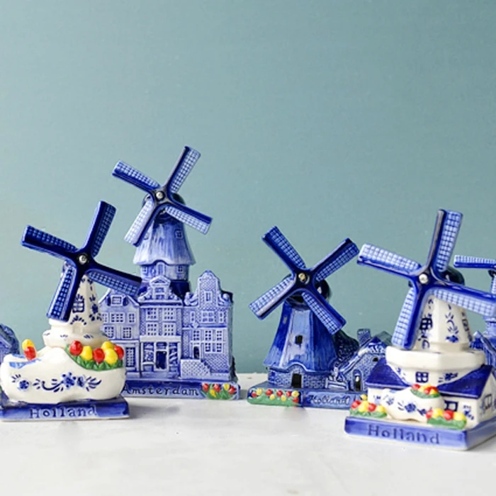 The blades will rotate. Dutch windmill ceramic handmade painting ornament