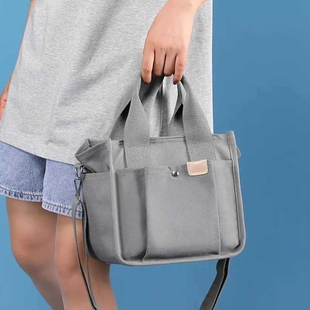 

Multi-pocket Japanese Style Crossbody Bag Handheld Zipper Canvas Shoulder Bag Mommy Bag All-match Solid Color Tote Bag Daily