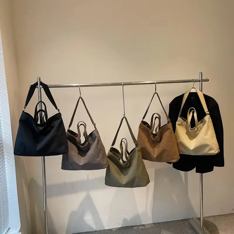 

2025 New Casual Large Capacity Solid Color Canvas Crossbody Bags Commute High Quality Versatile Simple Women's Shoulder Bags