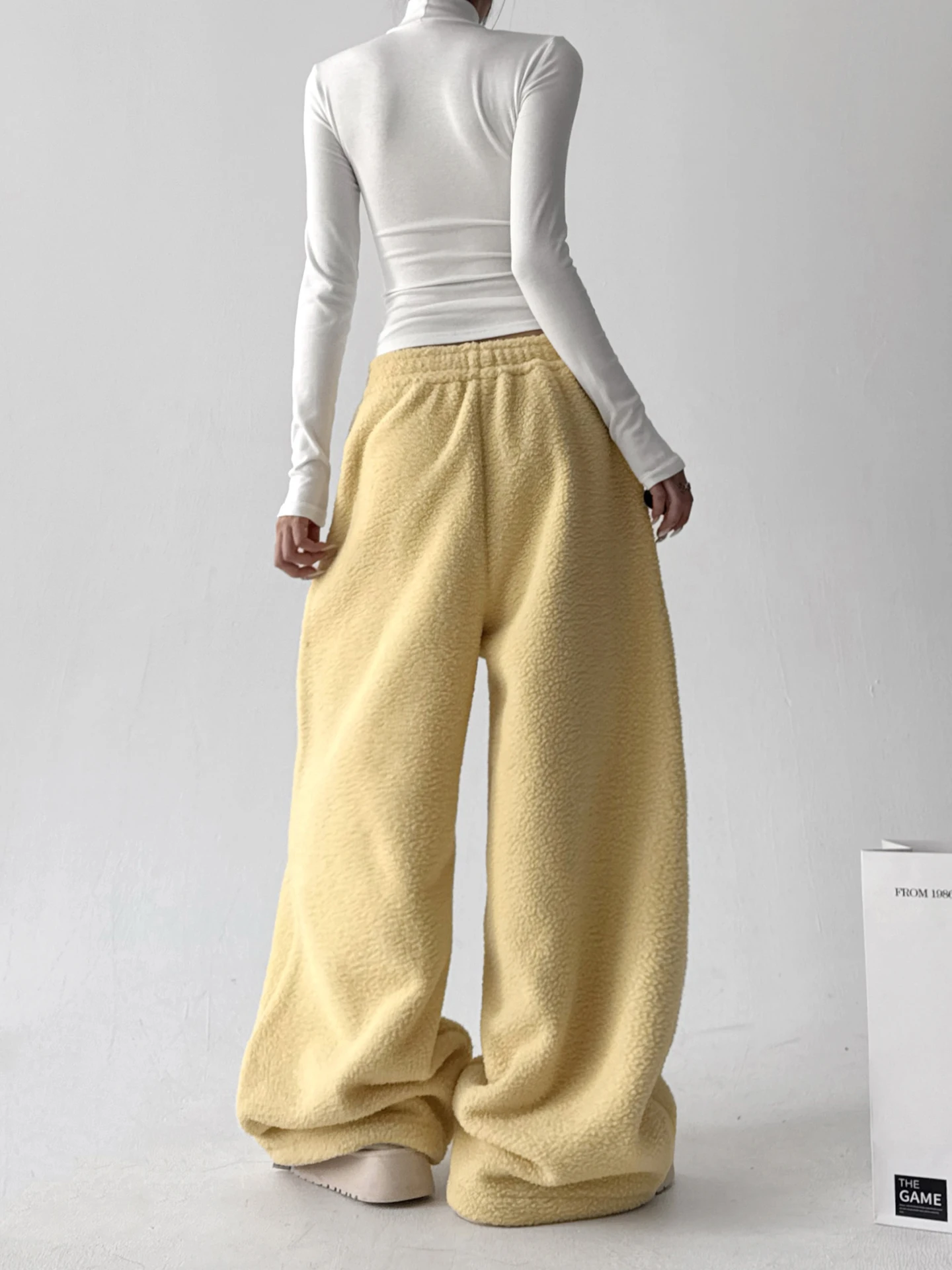 Pantalones de pierna ancha amarillo Fce para mujer Otoño Invierno Ultra ular nuevos pantalones de algodón forrados Sle Fce pantalones casuales sueltos y cálidos