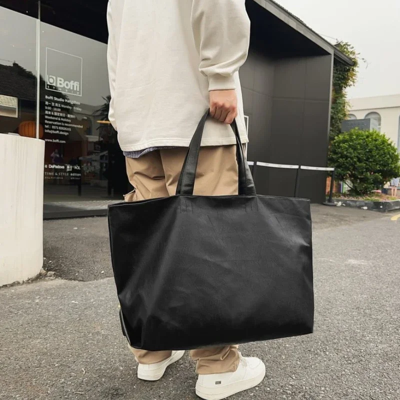 New PU Black Zipper Large Capacity Handbag Lightweight Soft Leather Shoulder Bag Unisex Simple Fashionable Versatile Tote Bags image 3