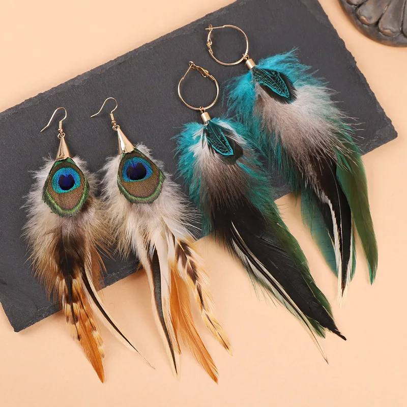 Pendientes de plumas exagerados únicos, pendientes largos de plumas creativas, pendientes grandes bohemios de moda, joyería llamativa para mujer al por mayor