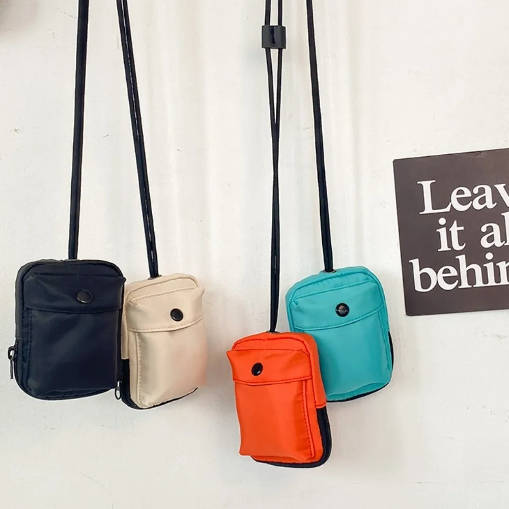 

Small Solid Color Mini Nylon Wallet Casual Tiny Lightweight Storage Bag Key Earphone Accessory Cute Halter Coin Pouch Women