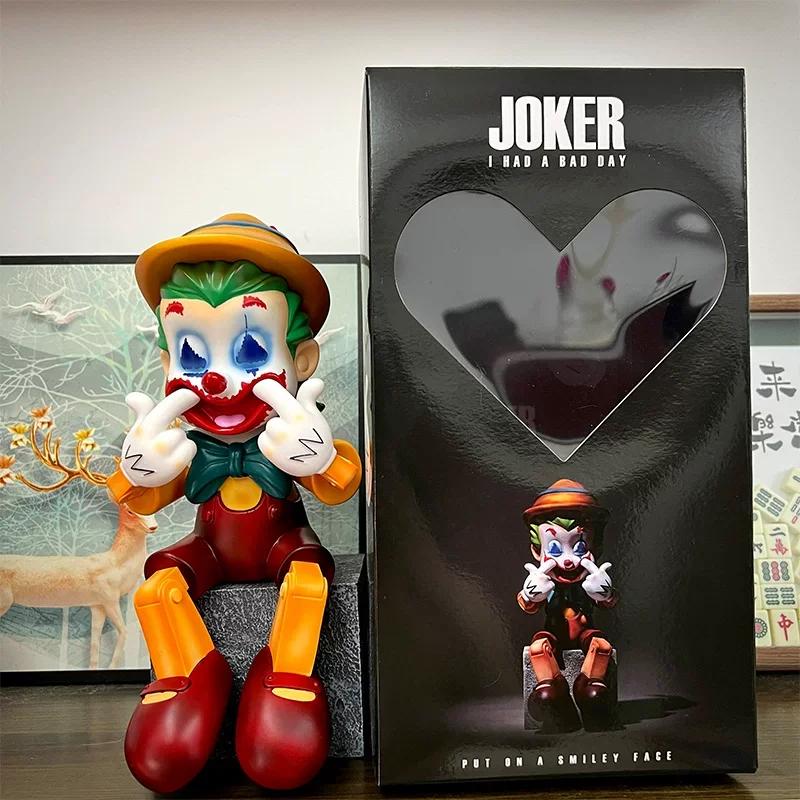 

Новая милая фигурка Пиноккио в образе Джокера, сидячая поза, забавное украшение для рабочего стола, модная коллекционная кукла, детская игрушка, подарок для коллекционеров