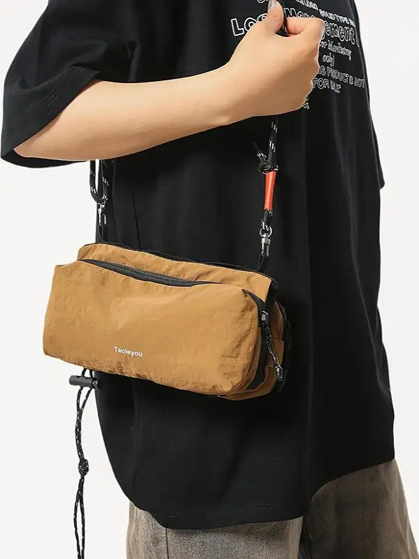 bolsa-de-Agua-portatil-para-esportes-ao-ar-livre-bolsa-transversal-fena-moderna-para-garra-de-Agua-e-celular