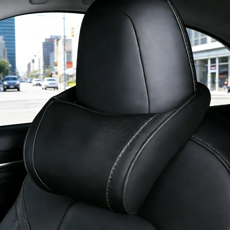 

Leather car seat neck pillows and headrests for Tesla Model Y, X, 3, S vehicles. Neck pillow