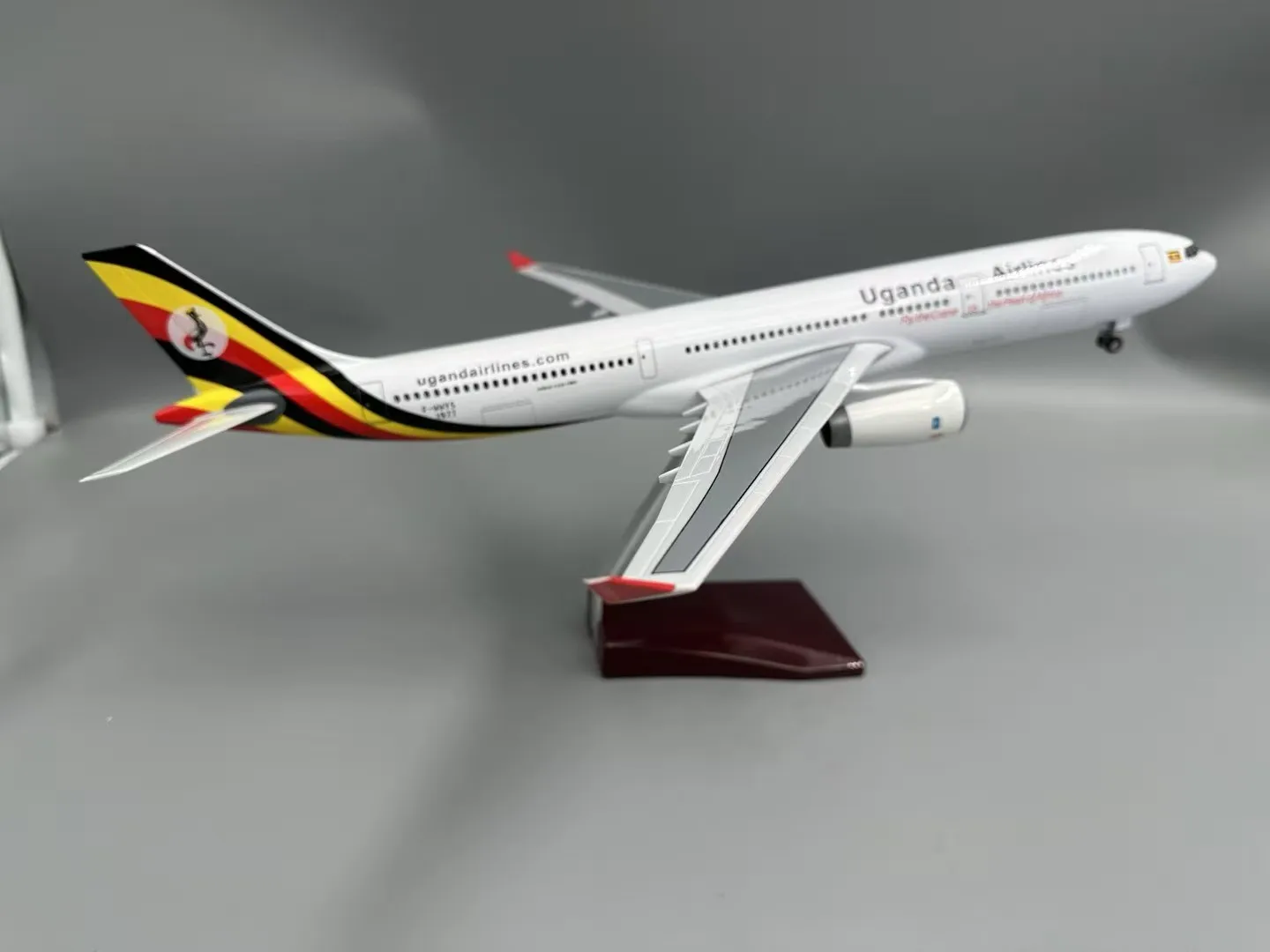 

1:135 Scale Plane A330 Uganda Airline Resin Die-cast Airplane W Landing Gear Wheels Lights Toy Airplane for Boys Collectible