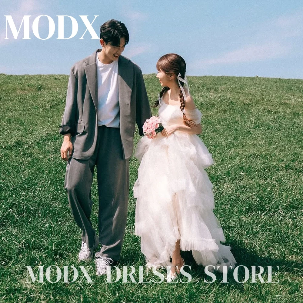 فساتين زفاف MODX أنيقة بدون أكتاف على شكل حرف a من التل كشكش بطيات متدرجة لحفلات الزفاف الكورية لالتقاط الصور مخصصة فساتين العروس 2025