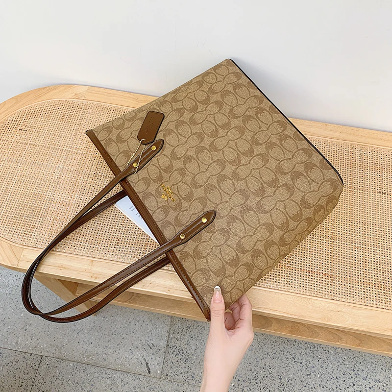 Bolsa tote popular para mulheres feita de couro genuíno com design clássico elegante de designer de luxo