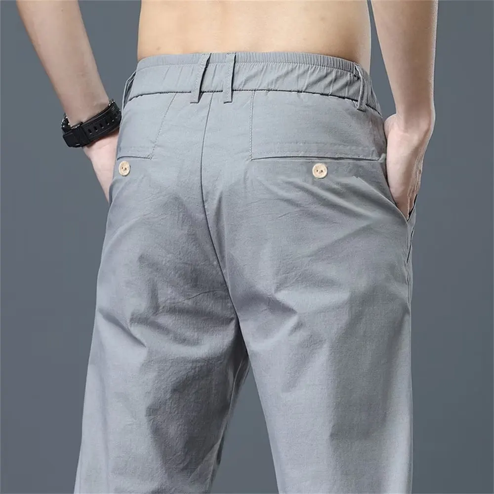 بنطلون رجالي صيفي طويل فضفاض مستقيم بخصر مطاطي من الحرير الجليدي سريع الجفاف بدون كي مريح وقابل للتنفس