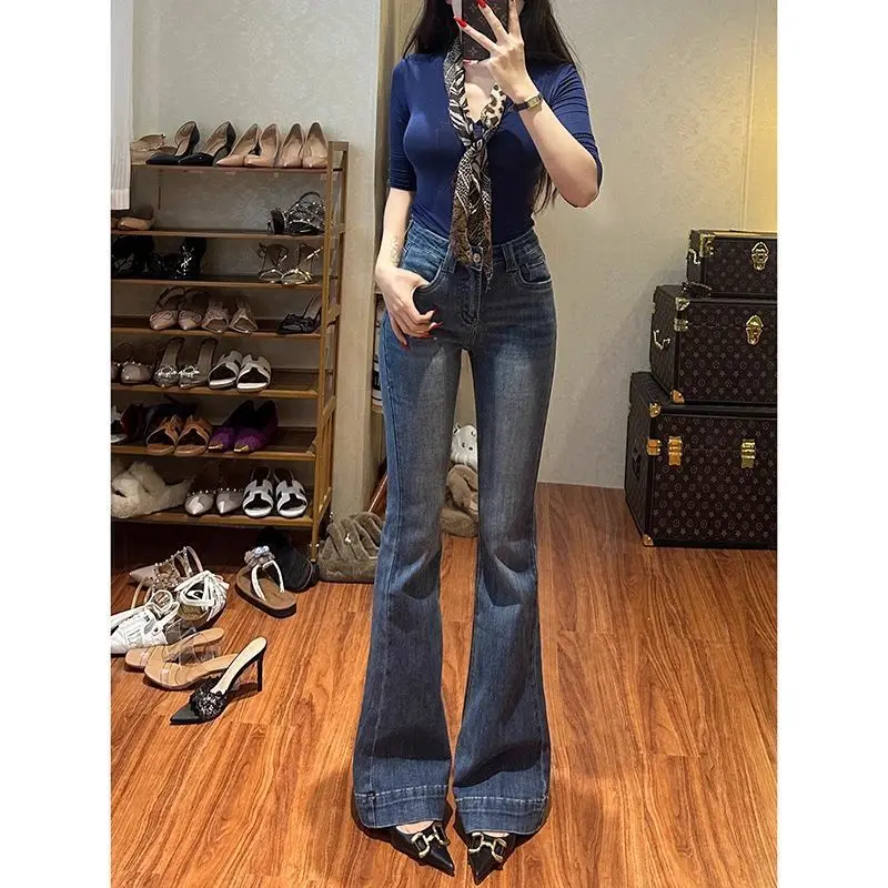 2025 Otoño Invierno pantalones vaqueros acampanados oscuros para mujer con forro polar cintura alta ajuste ajustado levantamiento de glúteos alargamiento de piernas