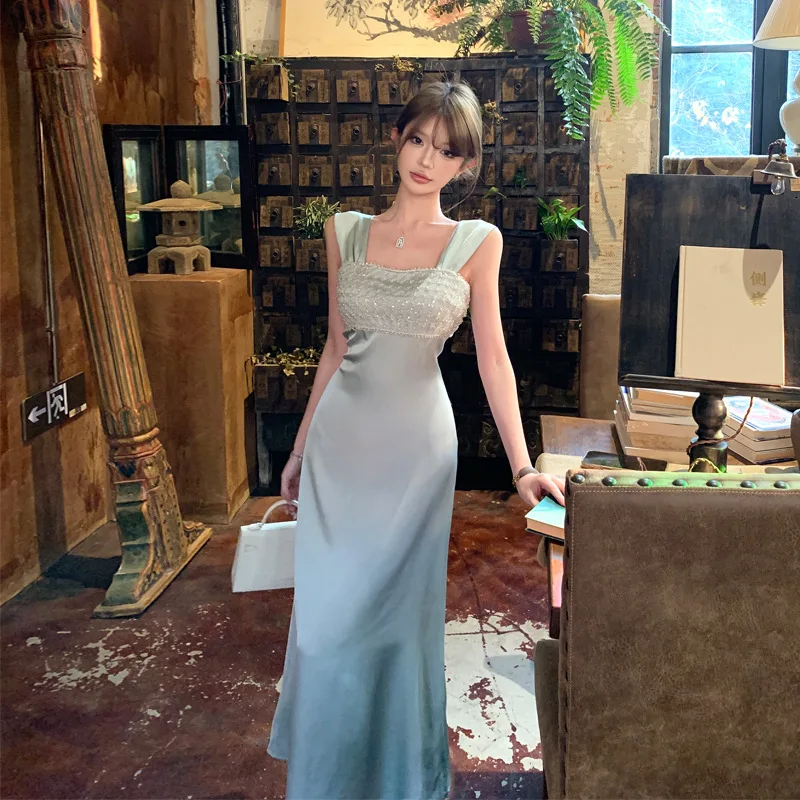 

Summer 2026 New Fashion French Satin Light Luxury Banquet Dresses Heavy Sequined Atmospheric Seaside Vacation Long Halter Dress