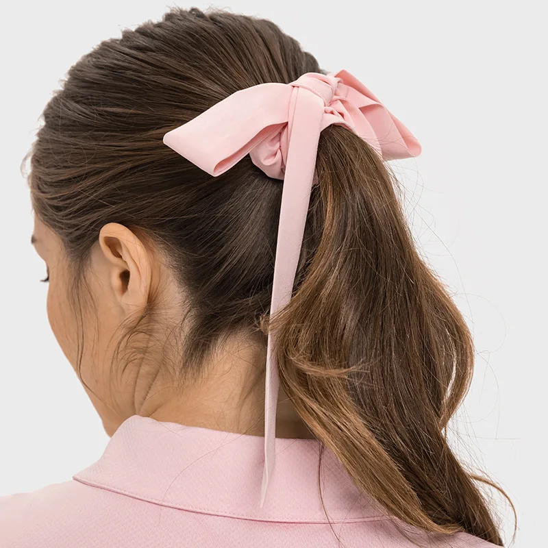 new moisture wicking sports headscarf is available in one size fits all, with adjustable tying and a bow for yoga headbands