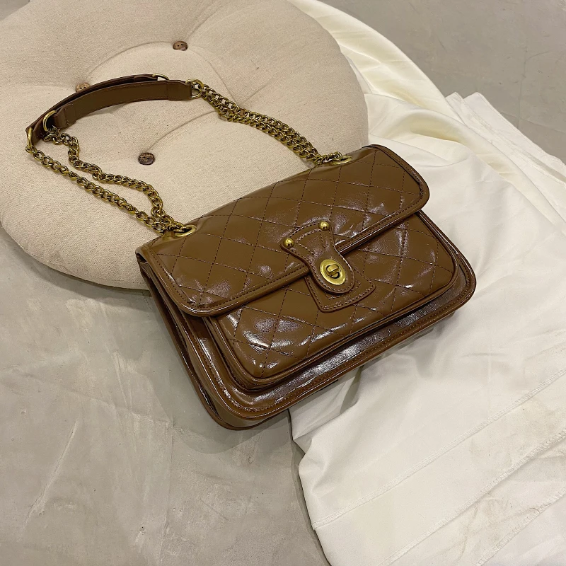 Borse a tracolla piccole retrò per le donne 2023 Fashion Designer Trend borsa a tracolla con catena in pelle PU Lock borse femminili