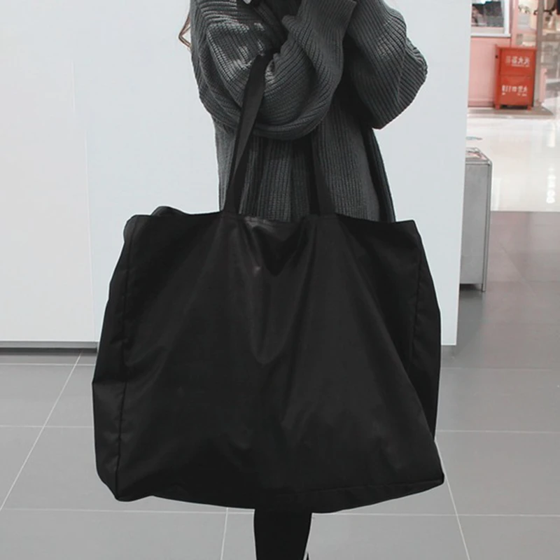 موضة جديدة حقيبة سفر مقاومة للماء سعة كبيرة حقيبة محمولة كيس التخزين الصلبة المرأة النايلون حقائب أمتعة قابلة للطي