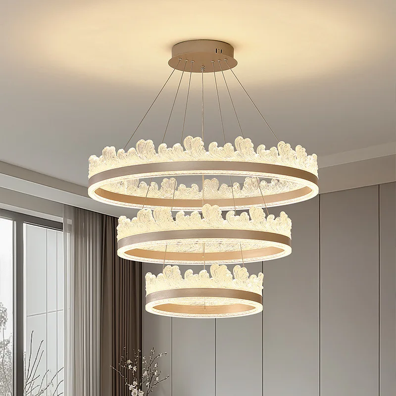 

Light luxury Italian living room chandelier 2025 new dining room light modern simple ring creative wave bedroom master