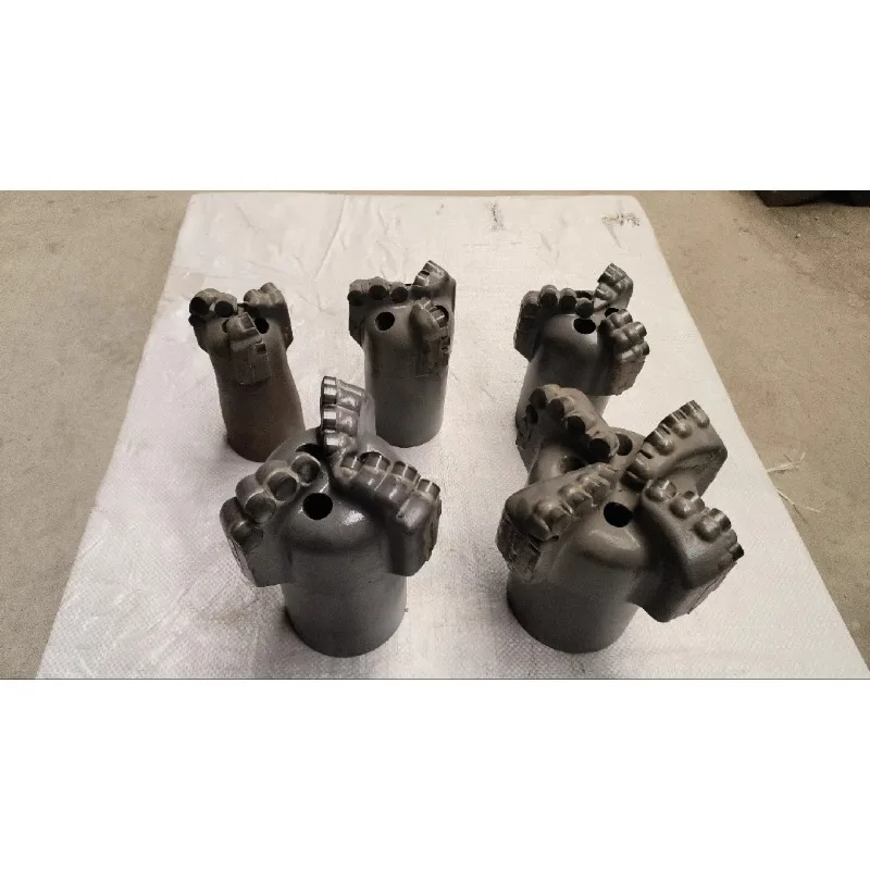 Diamond compact coreless stepped water well bit arc angle bit for mine