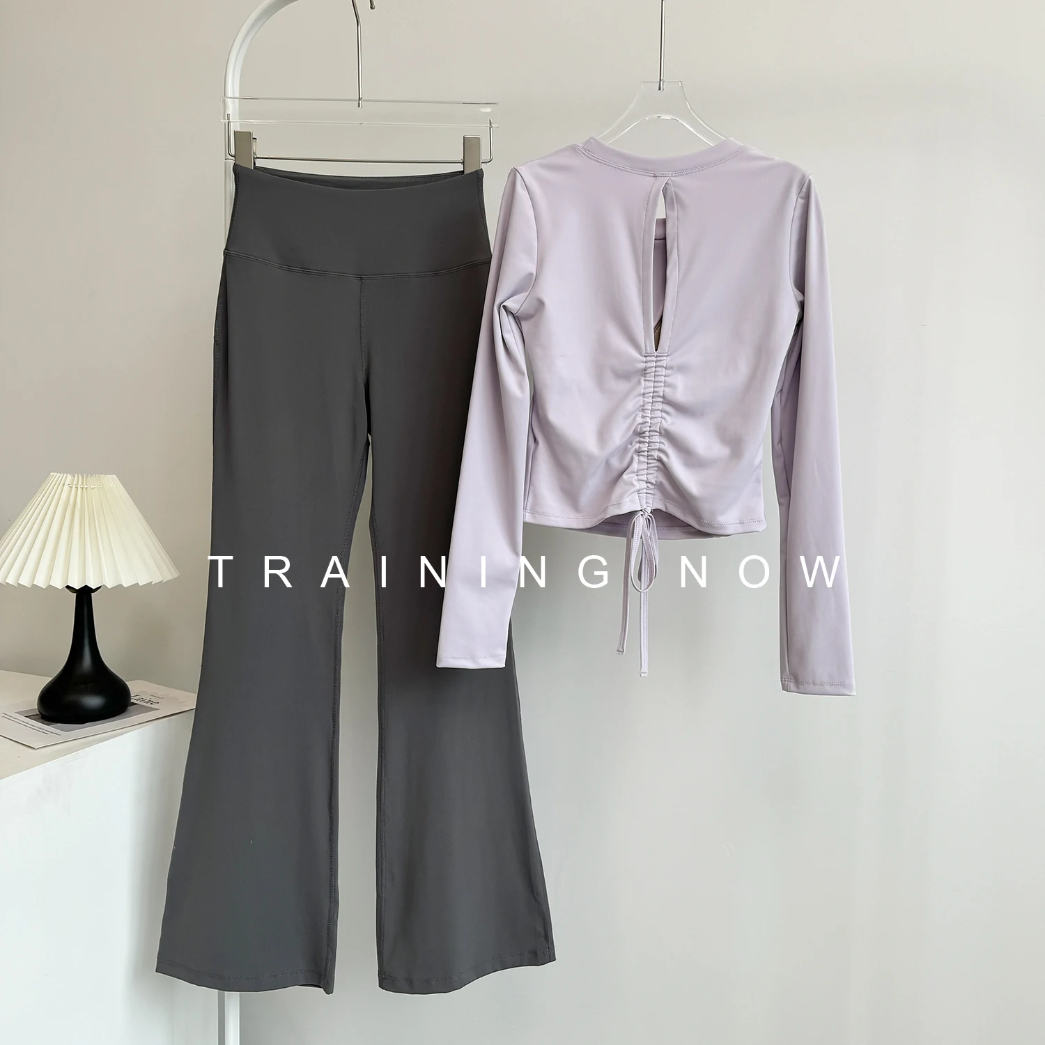 

Fashionable slimming fitness suit for women in autumn new Pilates yoga wear running belt chest pad long-sleeved sports trousers