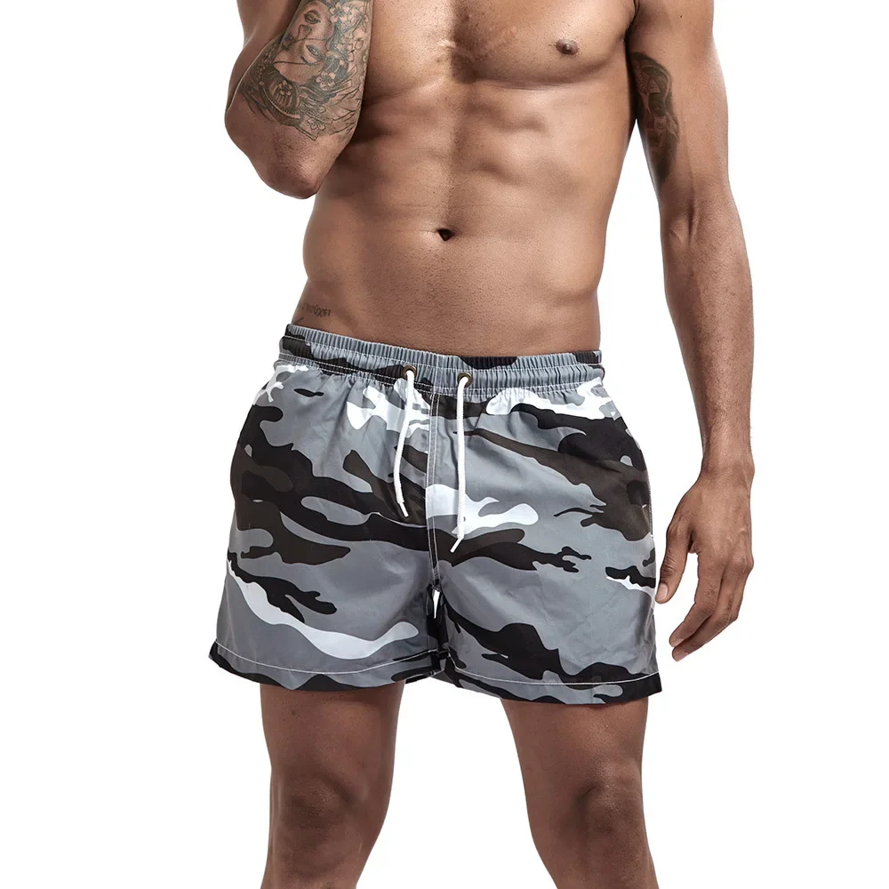 

New men's camouflage beach pants casual three-point pocket sports camouflage fitness shorts men