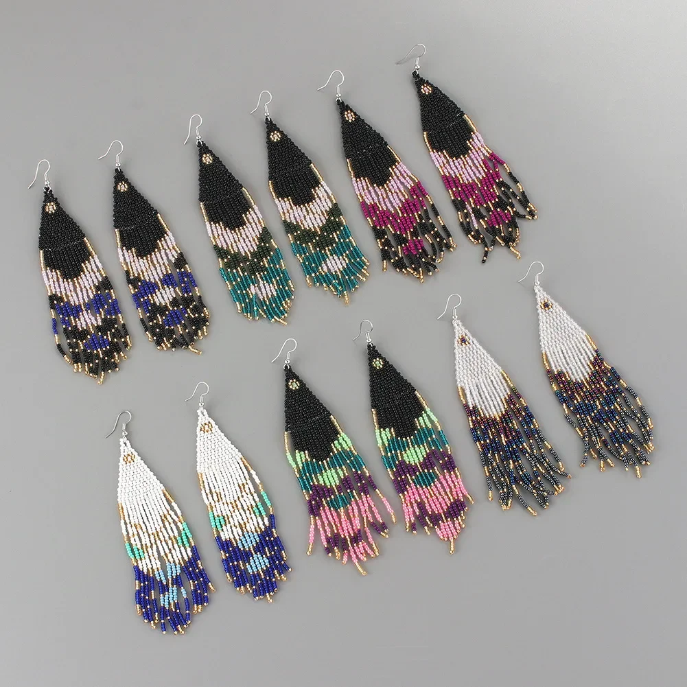 

Tassel Earrings Hand knitting Beaded Color matching Bohemia Retro nation alloy ma'am Rice Bead Earrings