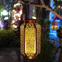 Creative LED Solar Iron Hanging Lamp for Outdoor Courtyard Garden Lawn Iron Piece Hollow Projection Ambient Lighting