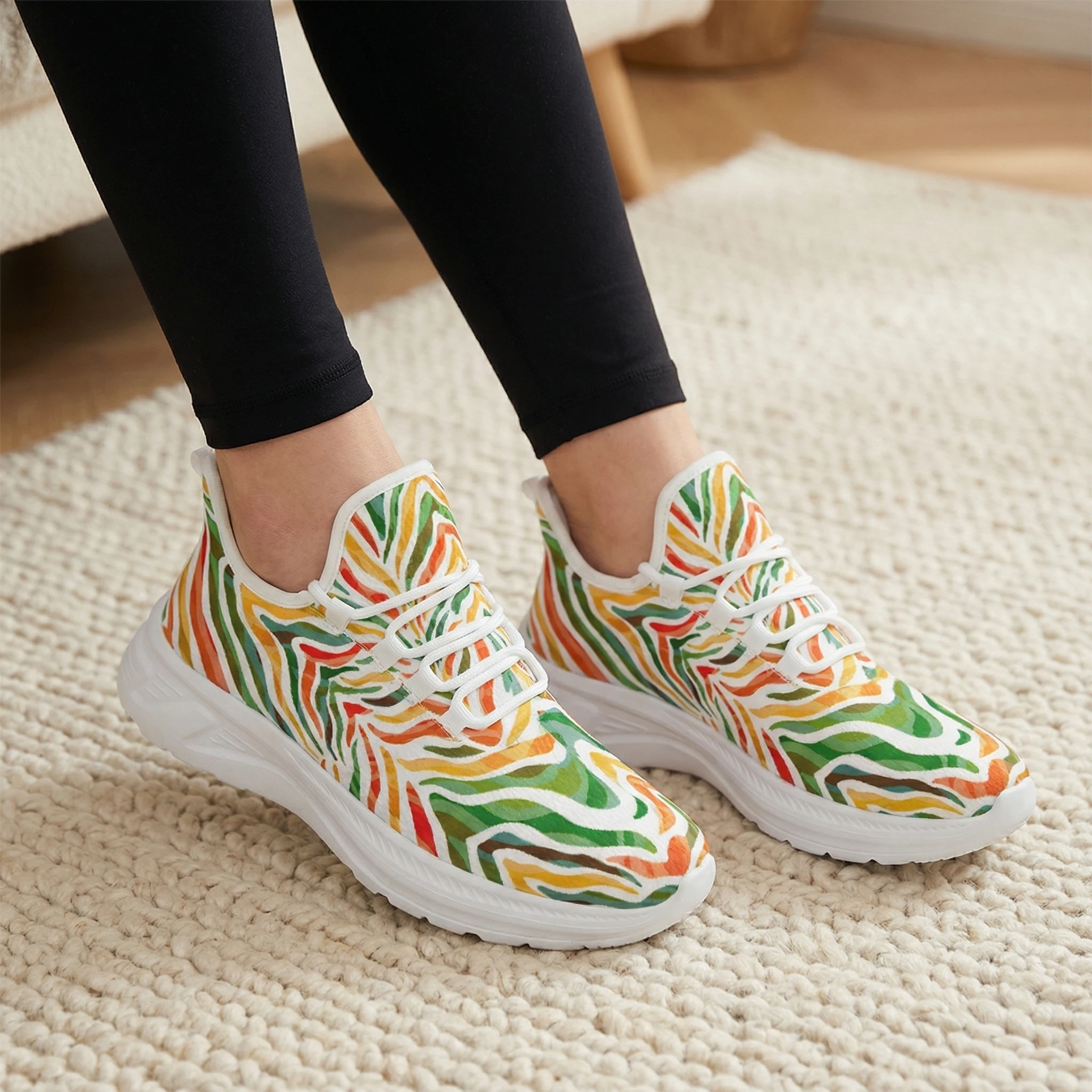 

Casual athletic shoes feature a bright, colorful zebra stripe pattern, a stylish street design and are comfortable