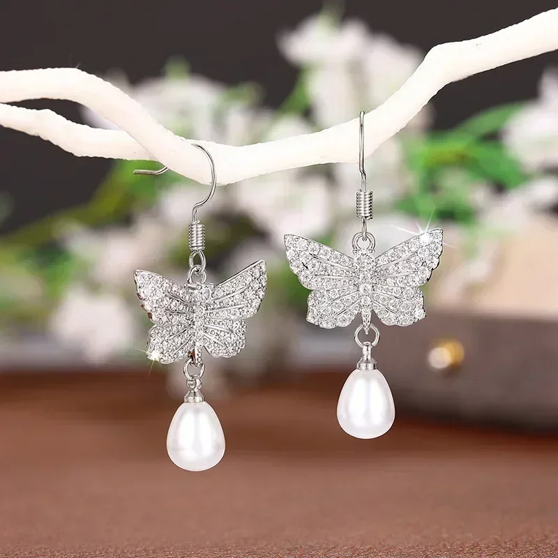 2025 New High End Immortal Qi Cube Zirconia Earrings, Clear Cold Wind Butterfly Pearls, Bridal Wedding Jewelry and Accessories