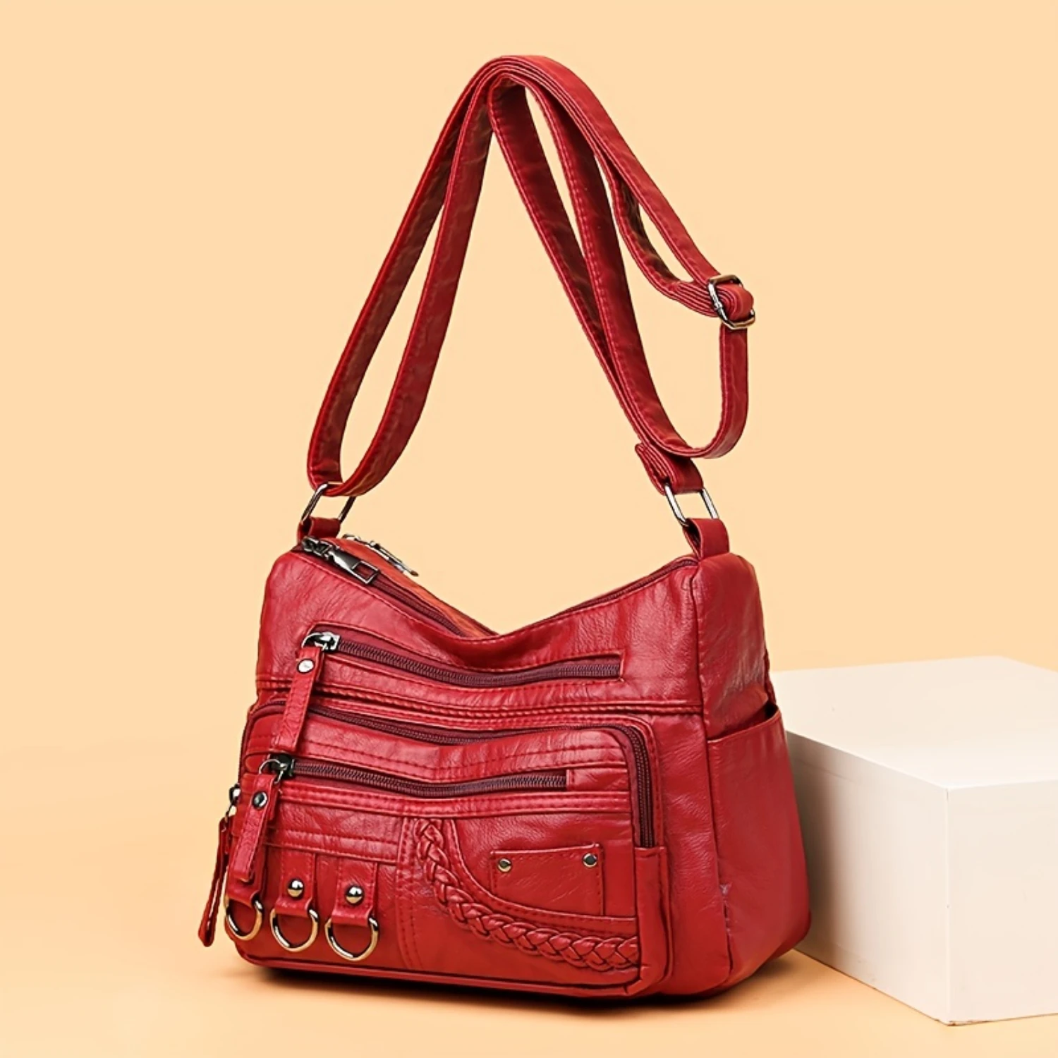 Damska torba crossbody ze stylowym warkoczem - olśniewający metalowy wystrój i wiele kieszeni zapinanych na zamek - miękka torebka ze sztucznej skóry dla