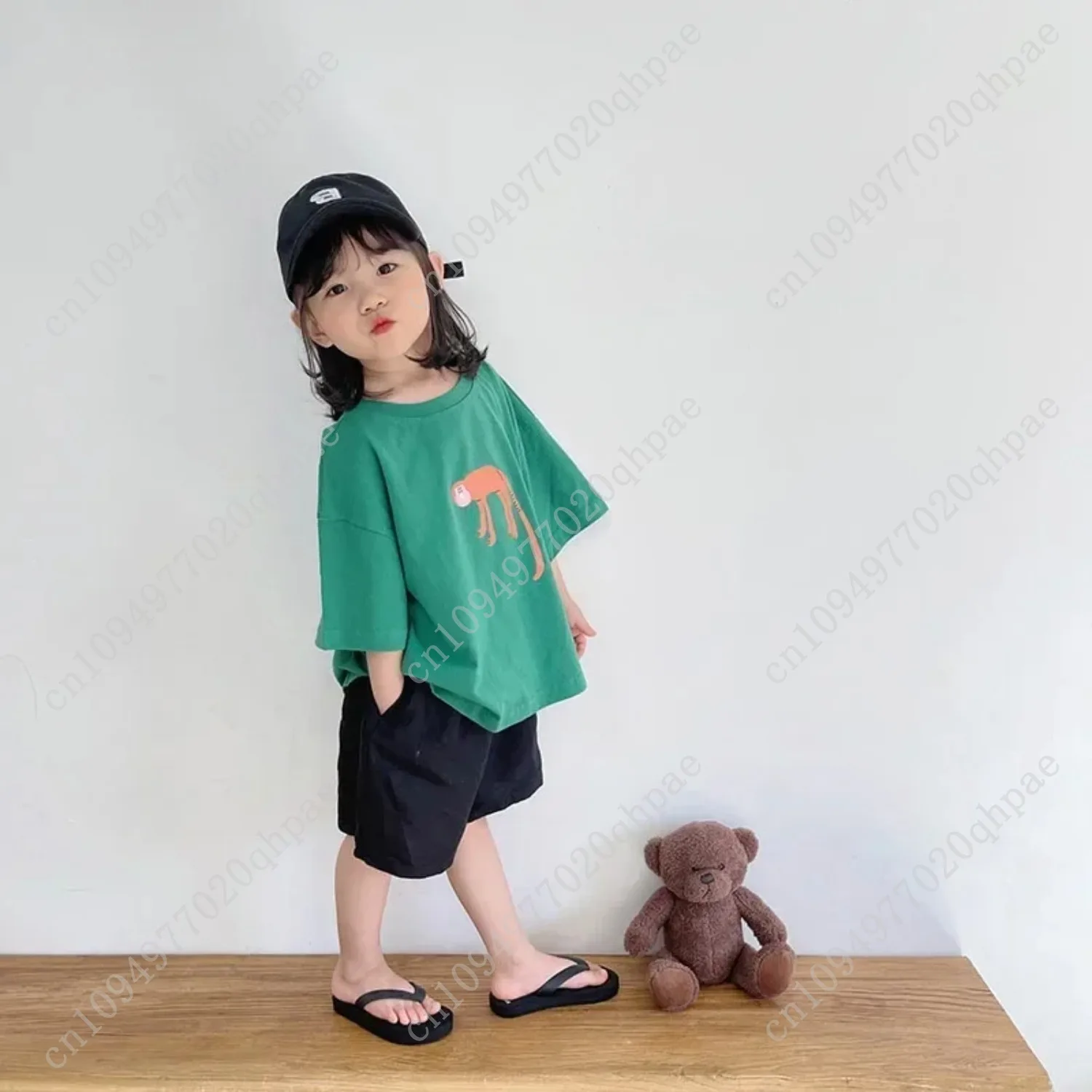 ‌ เสื้อยืดเด็กสไตล์เกาหลีลายการ์ตูนน่ารักทรงหลวมไหล่ตกแขนกลางสำหรับเด็กผู้ชายเด็กผู้หญิงเสื้อผ้าเด็กวัยหัดเดิน