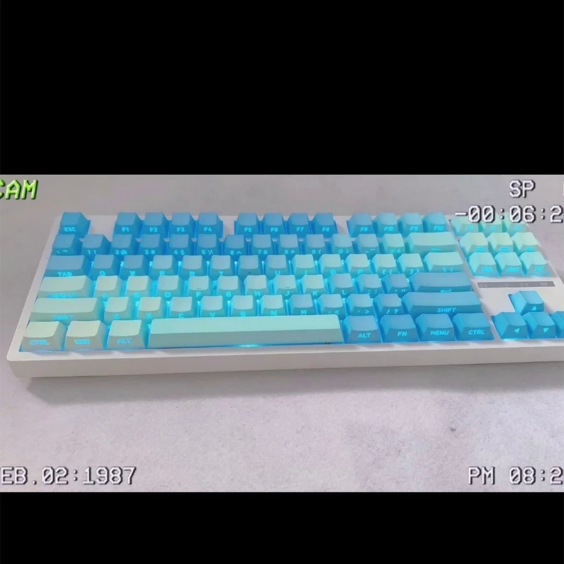 

Detective Original Keycap Frost Blue Pbt Two Color Dip Dyeing Process Oem High Positive Side Engraving Transparent Personalized