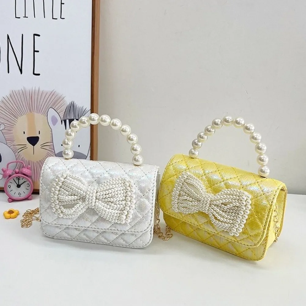 عارضة بو الجلود اللؤلؤ حقيبة يد صغيرة بلون القوس حقيبة كروسبودي حقيبة كتف محفظة الأطفال محفظة نسائية للعملات المعدنية للأطفال