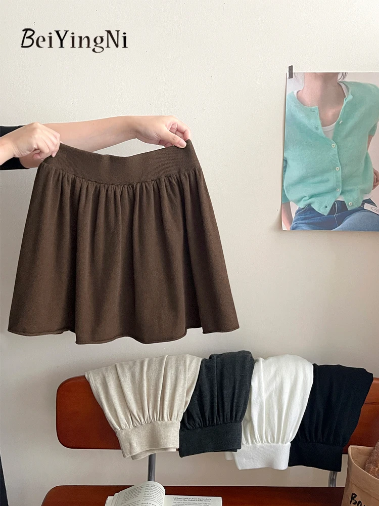 Beiyingni Donna Gonne a trapezio lavorate a maglia Tinta unita Moda coreana Elastico in vita Tutu Minigonna Francese Elegante Pianura Chic Gonne