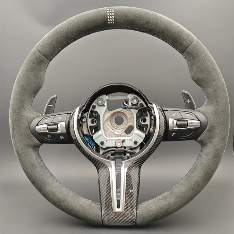 

Руль в стиле CS с карбоновыми вставками и замшевой отделкой для F01 F10 F20 F22 F30 F31 F32 M2 F87 M3 F80 M4 F82 F90 X5 F15 F16