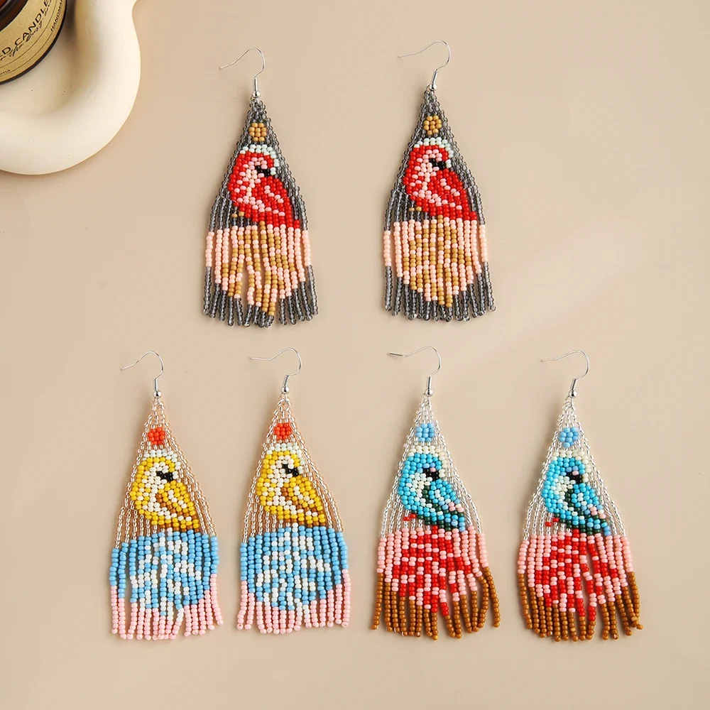 

Rice bead earrings Tassel Originality The bird Design Geometry Hand knitting Bohemia Alloy Fashion Simple Beaded earrings