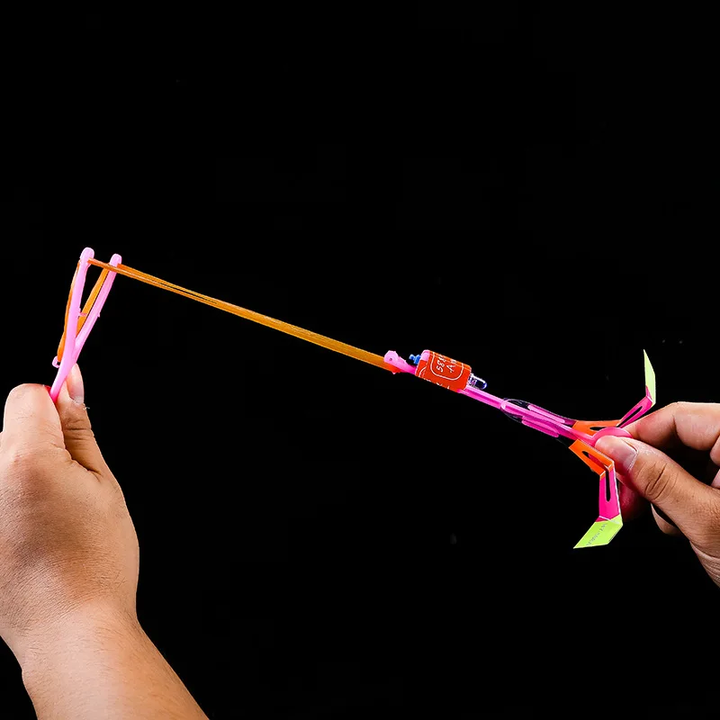 Increíble juguete ligero con forma de flecha, juguetes con luz LED para fiesta al aire libre, regalo divertido, banda de goma, catapulta que brilla en la oscuridad, helicóptero con cohete, juguete volador