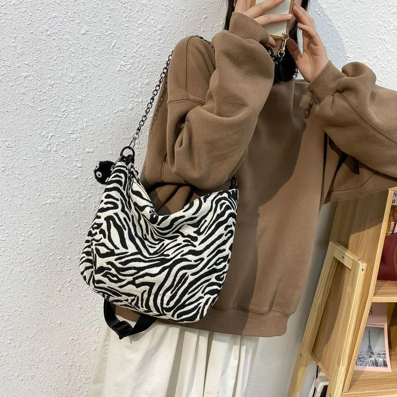 Bolso de lona estampado para mujer, bolsa de mano portátil de gran capacidad, combina con todo, nueva moda, 2023