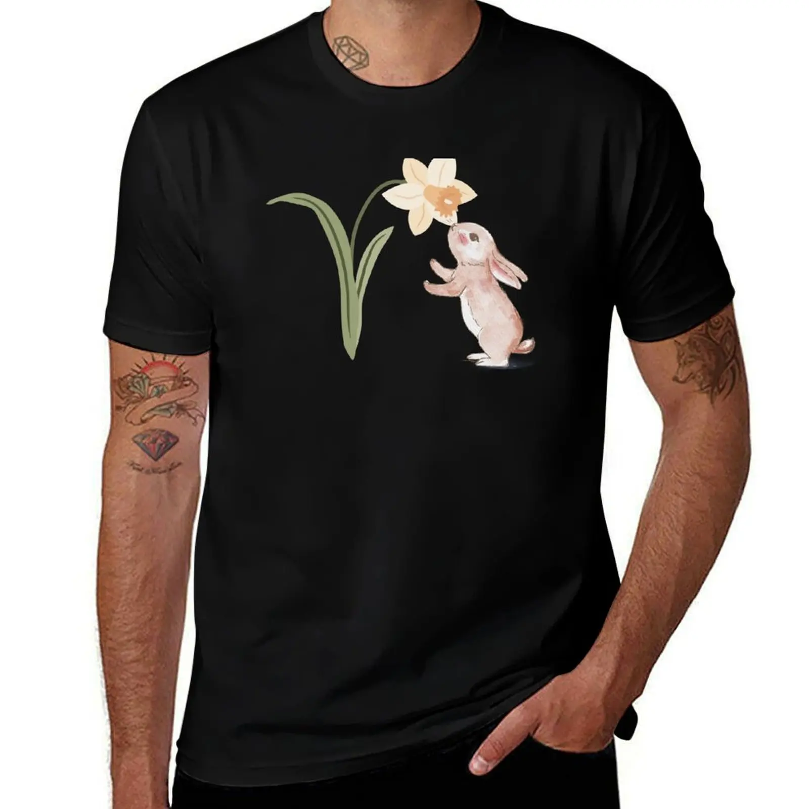 

The rabbit sniffs the Narcissus flower T-Shirt affliction shirts for a boy cotton man t-shirts t shirt men