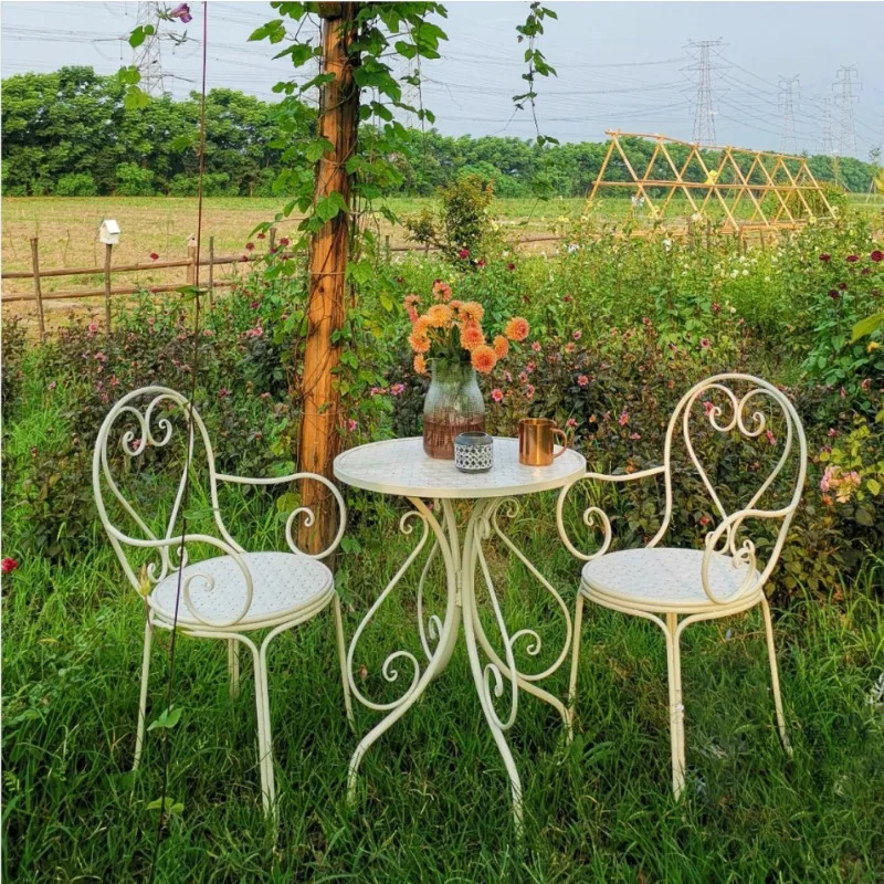 

Simple wrought iron balcony table and chairs three-piece set, courtyard garden outdoor leisure small coffee table, home