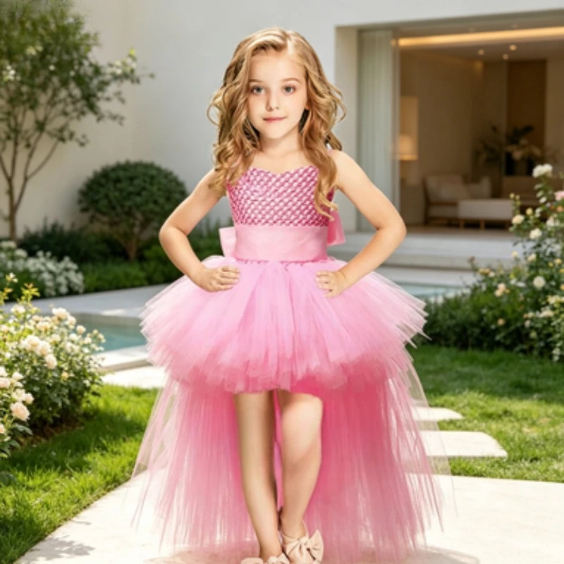 Long fluffy formal dress with a full skirt for New Year and birthday parties. A pink princess-style long tulle dress with lining
