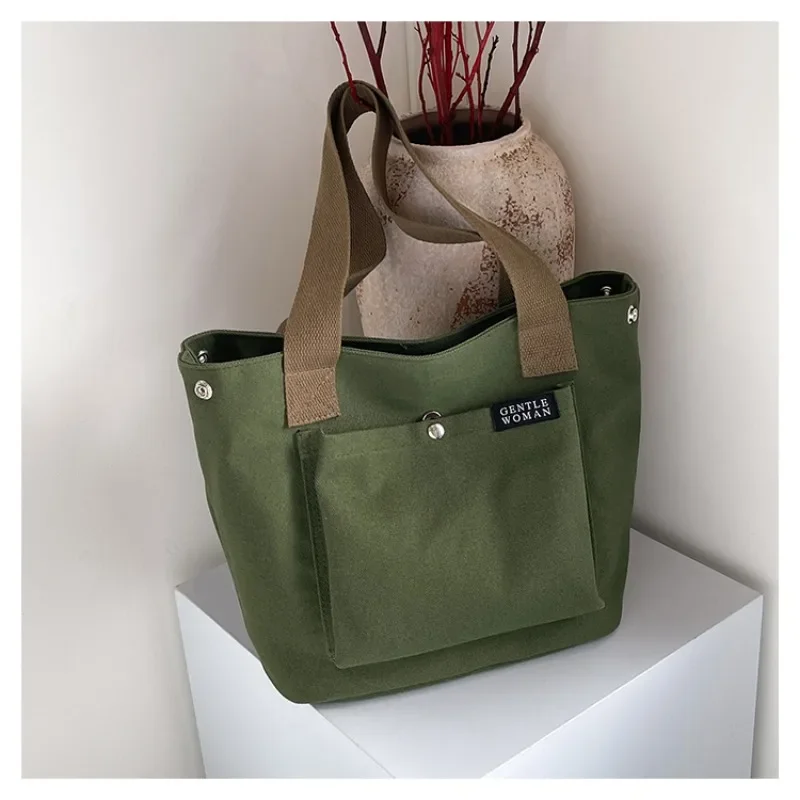 2025 New Canvas Simple Zipper Women's Designer Handbag Popular Solid Color Trendy Zipper Casual Good Looking Shoulder Bag