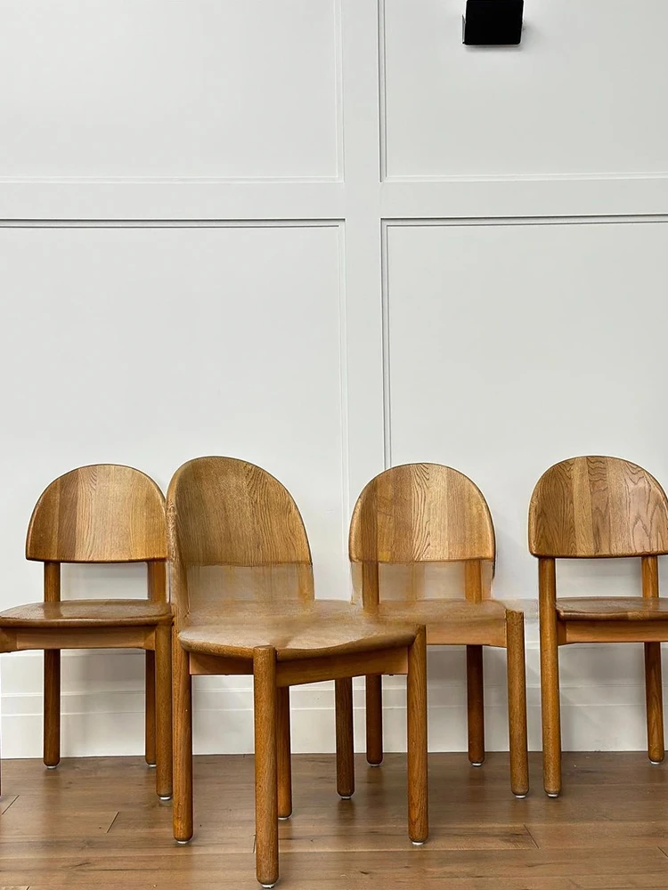 Medieval solid wood dining chairs, designed by home designers, featuring minimalist natural wood art backchairs, dining chairs