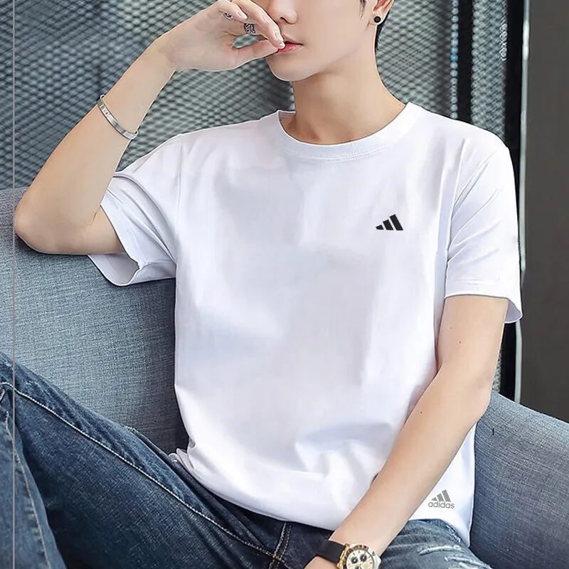 

Adidas White Simple Sports T - shirt. With a Classic Brand Logo and Breathable Fabric, It's an Ideal Choice for Sports Enthusias