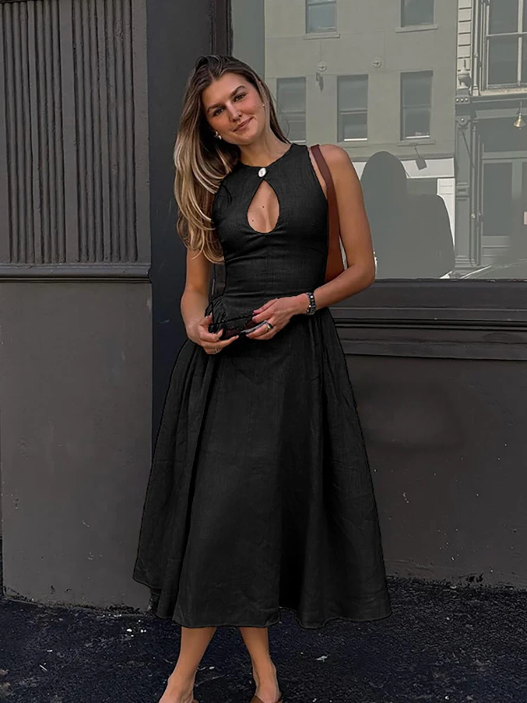 JULISSA MO Sexy Hollow Out A-line Women Maxi Dress Black Sleeveless Single Button Dress Femme Autumn Slim Elegant Party Clubwear