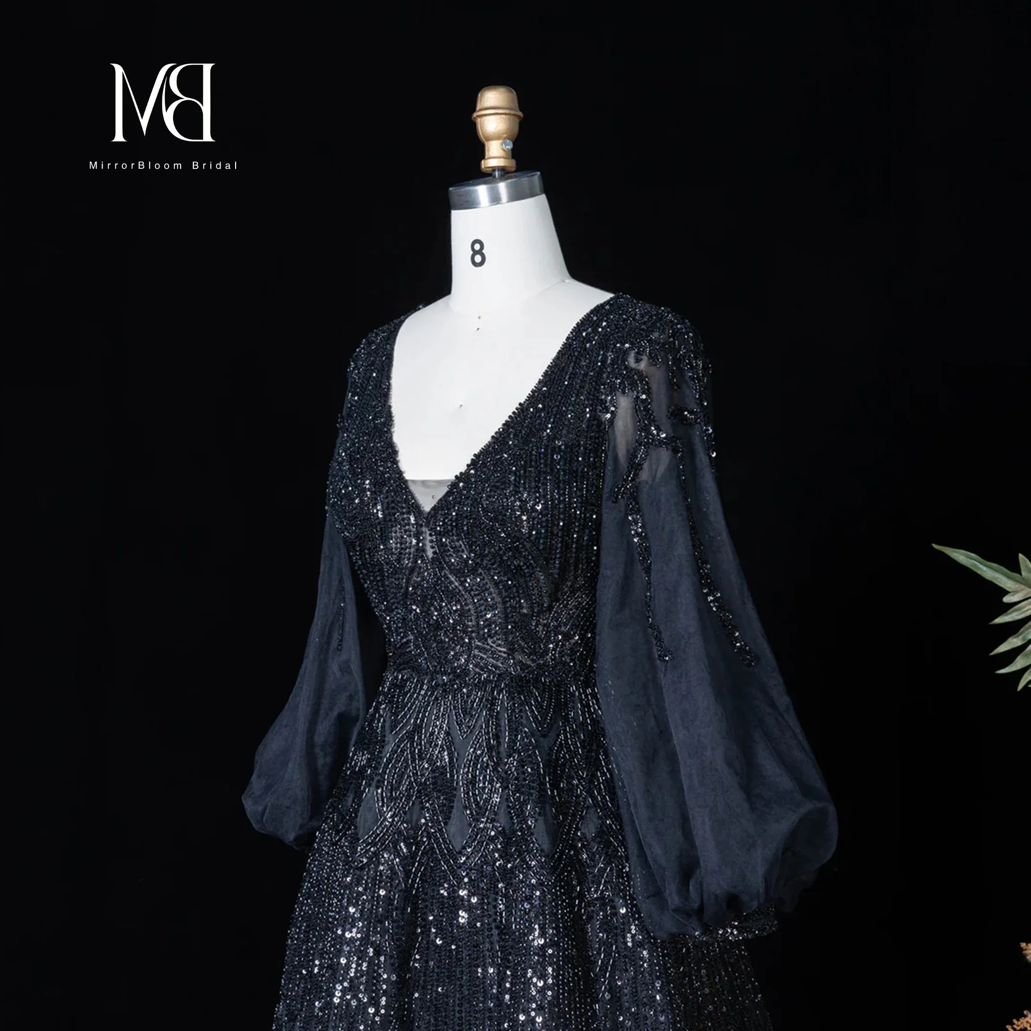 Black floor-length chiffon gown featuring a V-neck long sleeves and sequin embroidery ideal for formal occasions and balls
