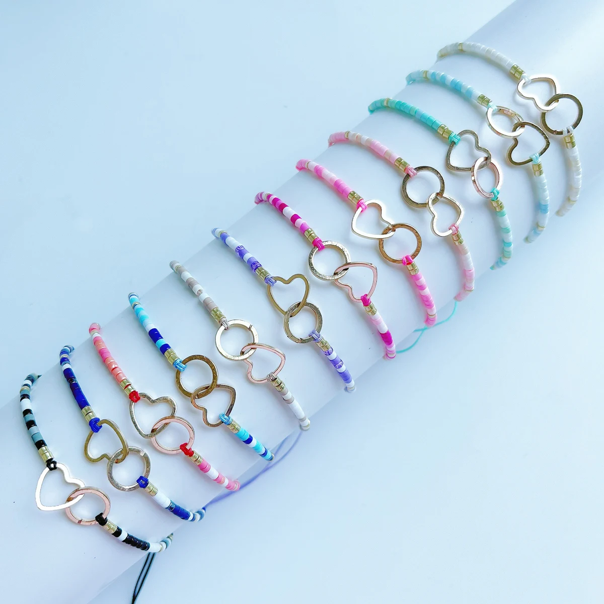 

12 Piece Set Of Heart-Shaped Copper Multi Colored Rice Bead Bracelet With Fashionable Ladies Temperament Adjustable Bracelet Set