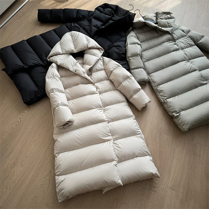 2025 invierno nuevo abrigo con capucha de plumón de pato blanco chaqueta de plumas gruesa y esponjosa coreana para mujer abrigo largo a prueba de viento para mujer