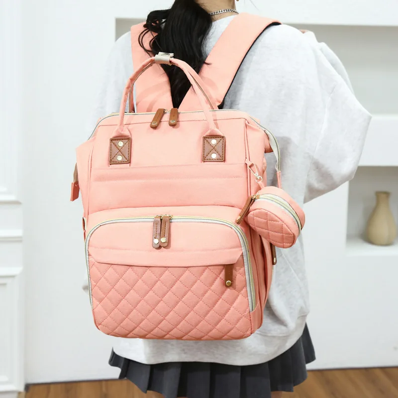 New Mommy Bag Large Capacity Premium Mother and Child Backpack Multi functional Baby Bed Insulation Waterproof