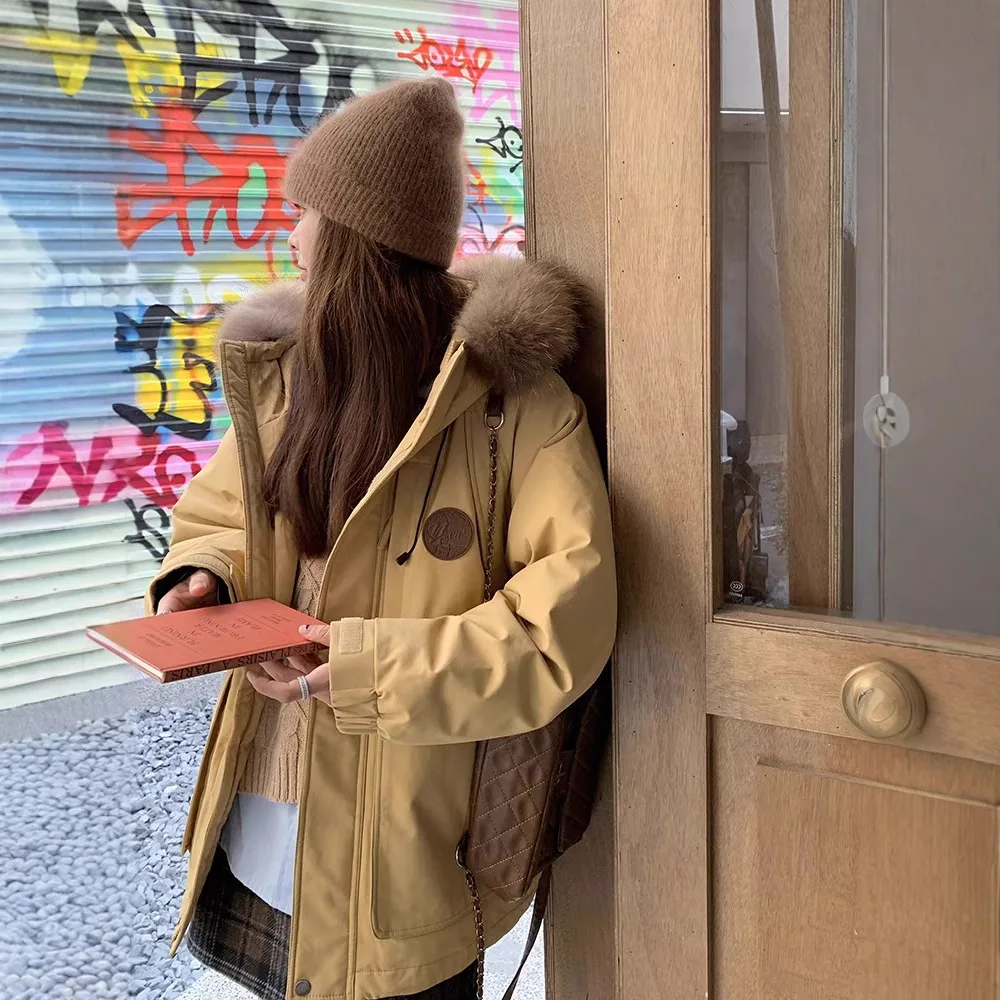 سترة نسائية شتوية من القطن بتصميم كبير بياقة من الفرو ملابس عمل سترة بيضاء مبطنة أسفل معطف سميك ملابس خارجية مقاومة للرياح