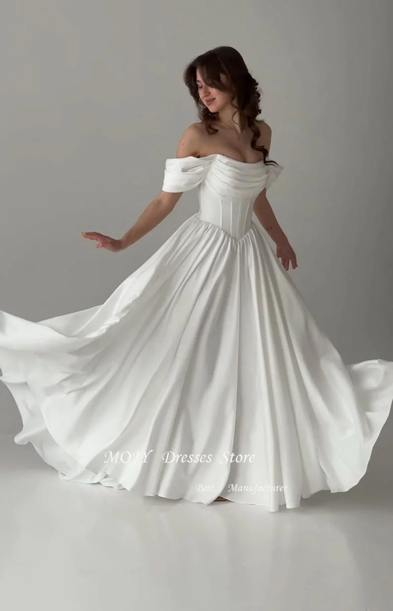 Mojy Corea Abiti da sposa con spalle scoperte Piega con volant Abito da sposa a trapezio Realizzato su misura Garona Abito da sposa Servizio fotografico