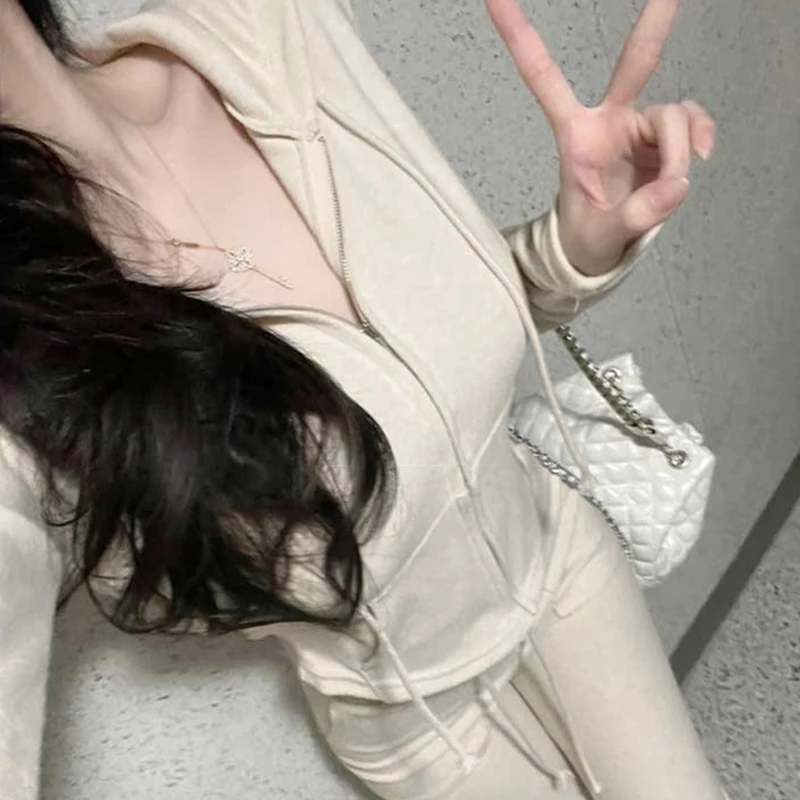 ชุดเซ็ตเสื้อฮู้ดและกางเกงขายาวสไตล์เกาหลีลำลองเซ็กซี่สำหรับผู้หญิง ทรงเข้ารูป แขนยาว ซิปปิด